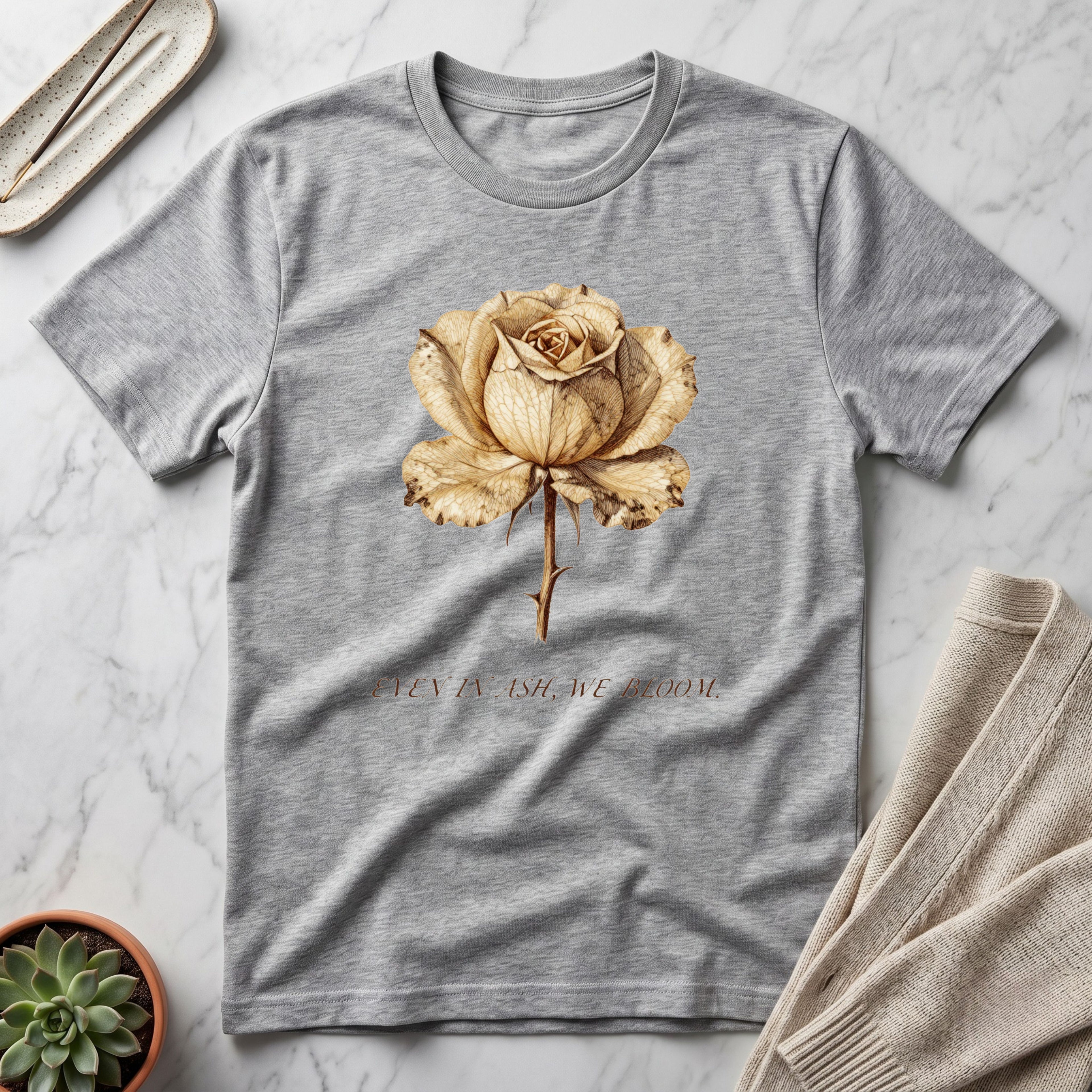 Even In Ash, We Bloom.™ T-Shirt